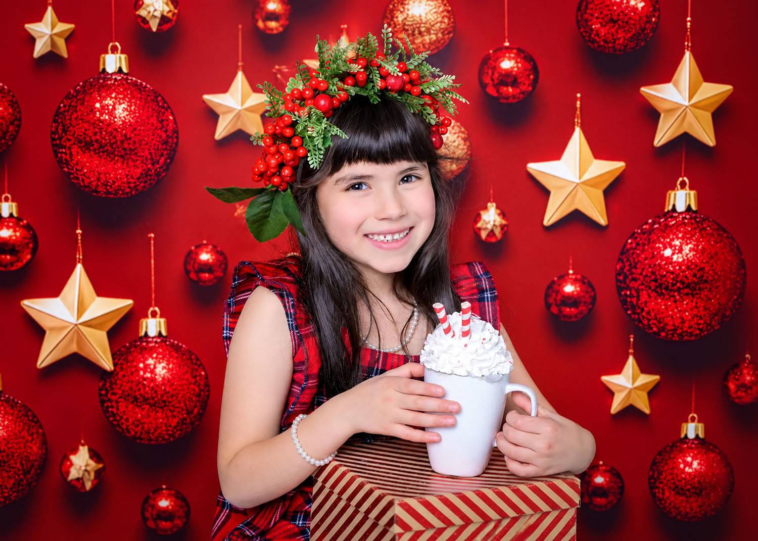 Christmas Sparkle | Glasgow Family Photography Little girl holding hot chocolate in a festive Christmas photoshoot with red baubles and gold stars in Glasgow